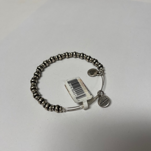 Alex and ANI Shiny Silver-tone NILE Metal BEADED Bangle Bracelet.
Bracelets - Picture 6 of 9